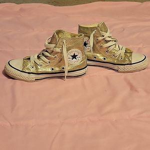 Gold hightop converse